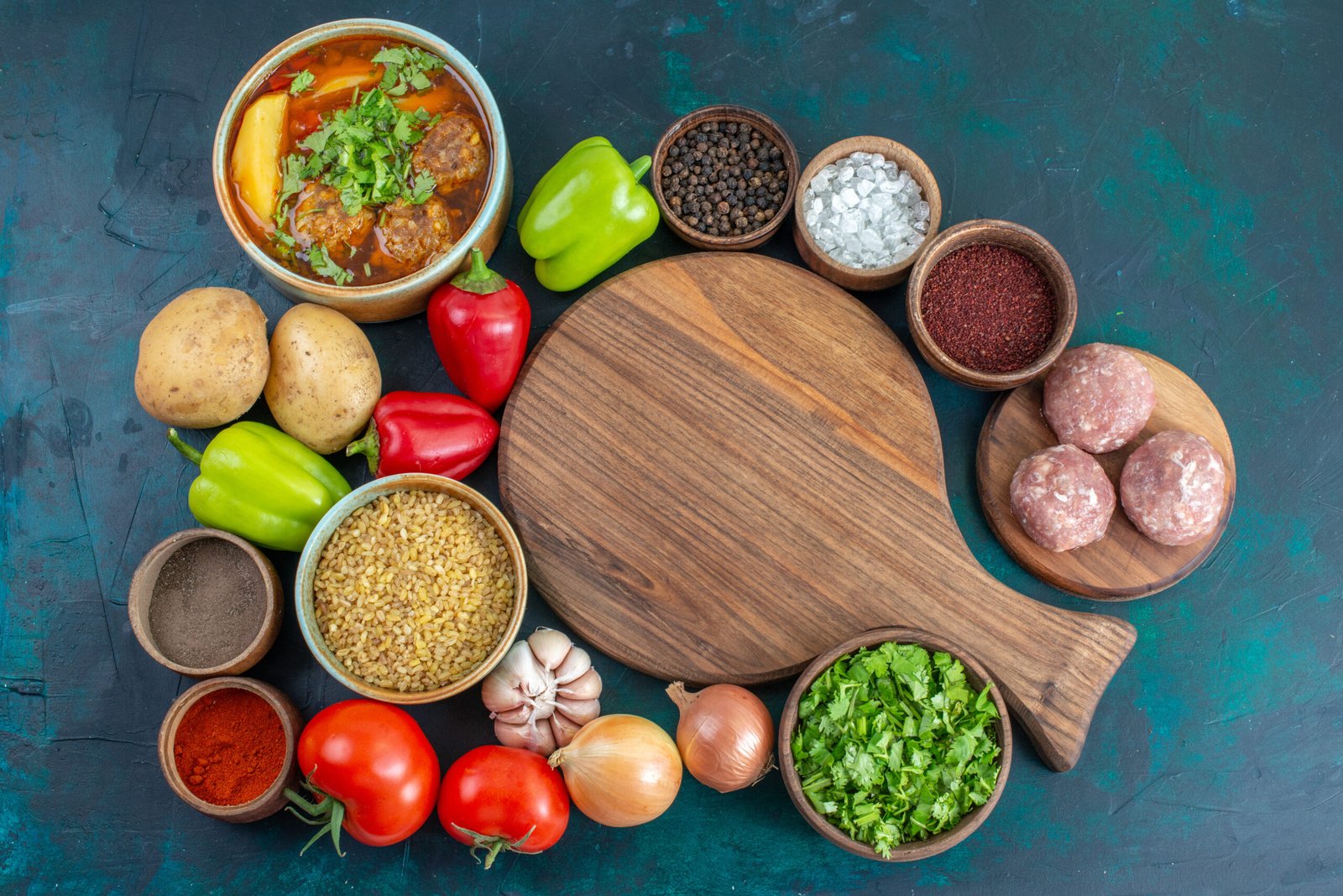 top view fresh vegetables with different seasonings meat soup greens dark blue desk